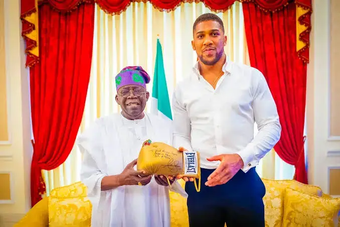 AJ with President Tinubu.