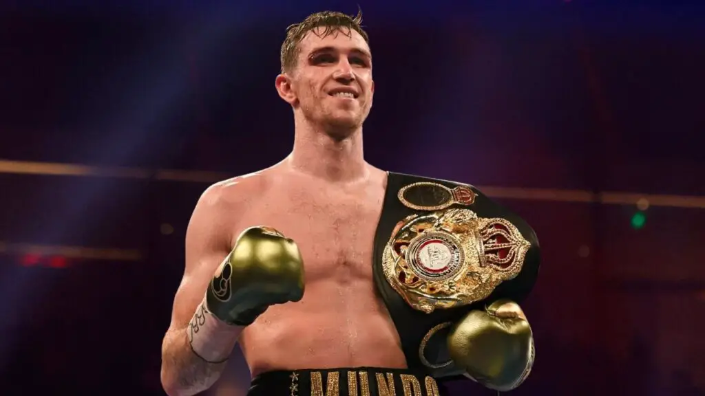 David Benavidez Next Fight Targets a UK Rival 2 Callum Simpson in the ring with his title belt after a win