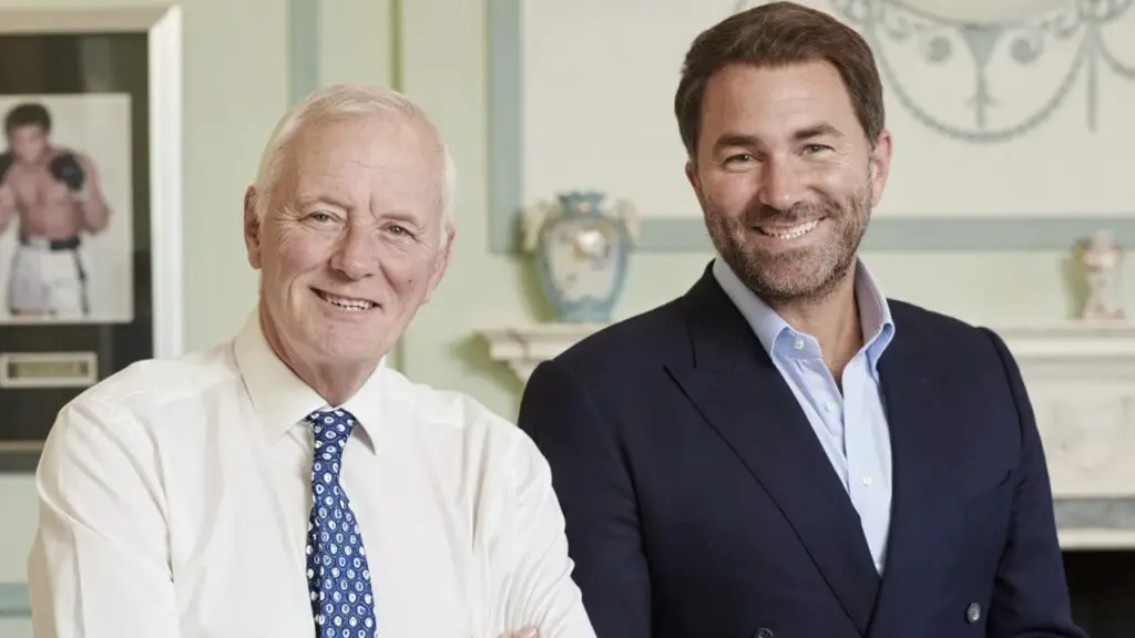 Unveiling Eddie Hearn's Net Worth and How the Boxing Promoter Built His Fortune 4 Eddie Hearn sat with his Father and founder of Matchroom Sport, Barry Hearn