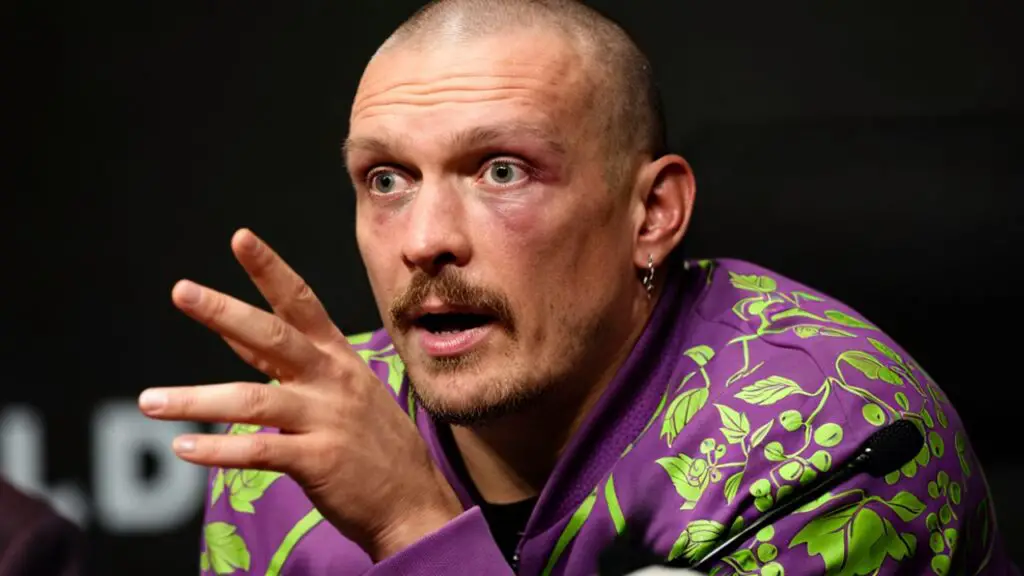 Oleksandr Usyk speaks to the press in a post fight press conference