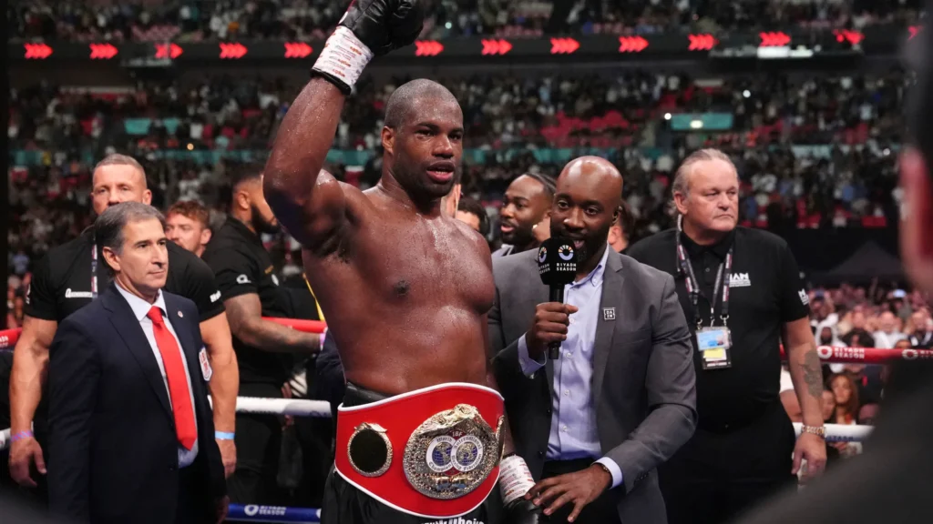 Daniel Dubois Set to Unleash Chaos in Huge Oleksandr Usyk Rematch 2 Daniel Dubois celebrates victory against Anthony Joshua at Wembley Stadium.