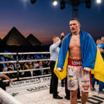 Usyk survives scare with 11th-round stoppage of Verhoeven in Giza
