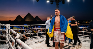 Usyk survives scare with 11th-round stoppage of Verhoeven in Giza