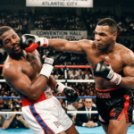 Mike Tyson vs Michael Spinks: Mike Tyson knocks out Michael Spinks in 91 seconds to unify heavyweight titles