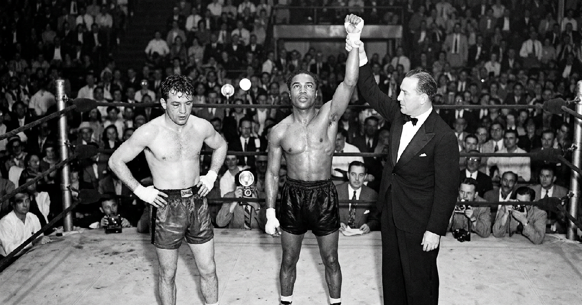 Henry Armstrong vs Lou Ambers 1938: Henry Armstrong defeats Lou Ambers by split decision for third title